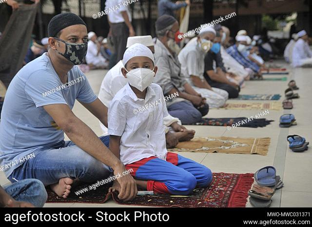 Muslims attending Friday prayers during the coronavirus pandemic at Hazrat Shahjalal Dorgarh Mosque, while maintaining social distancing and other health...