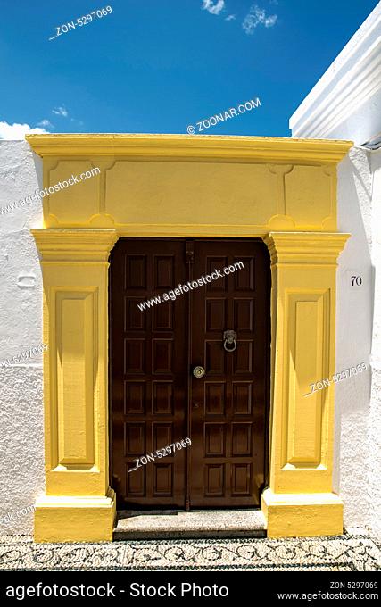 Old pattern door and white house in Rhodes
