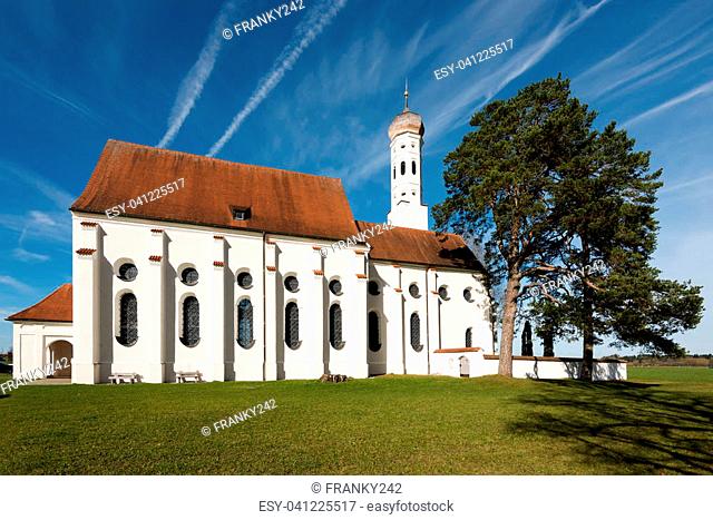 Beautiful St. Coloman church near Fussen on a beautiful autumn day in Bavaria, Germany