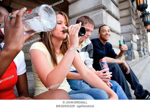 Group of teenagers drinking