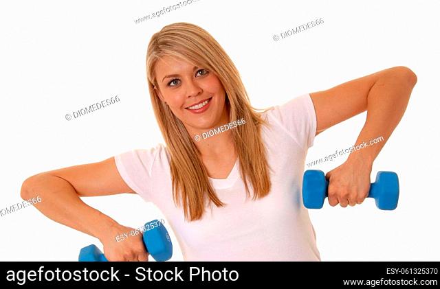 Lovely blond girl working out with weights