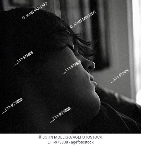 Young man sleeping in living room