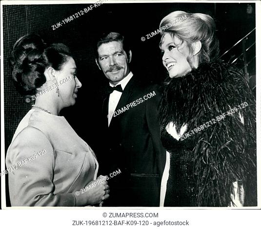 Dec. 12, 1968 - Princess and Brigitte converse in French. Princess Margaret talking in French with Brigitte Bardot, in center, Stephen Boyd