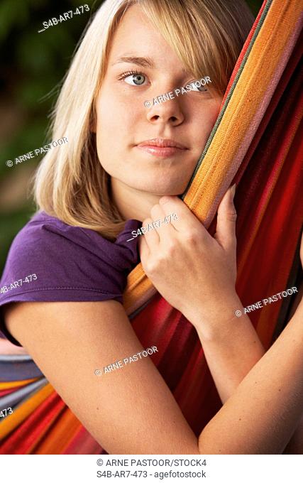Teenage girl in hammock, Vienna, Austria
