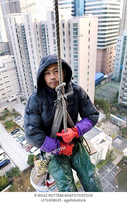 Cleaning the windows of highrises in China