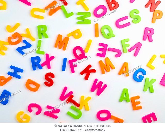 multicolored English alphabet letters on a white background, full frame