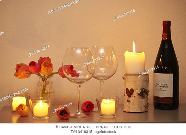 Romantic dinner with red wine and a candle, Germany