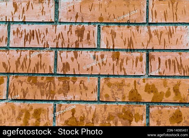 brown old dirty brick wall consists of rectangular blocks background base