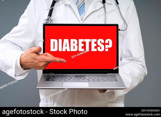 Close-up Of Male Doctor Holding Laptop With Diabetes Text