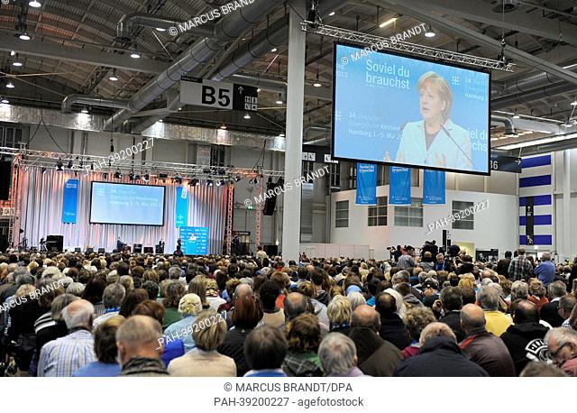 German Chancellor Angela Merkel speaks at a panel on 'What is creaion worth in a globalised world?' at the German Protestant Church Congress in Hamburg, Germany