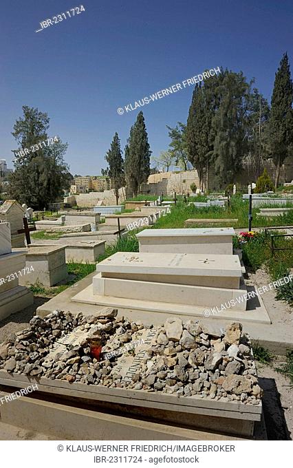 Grave of Oskar Schindler, many grave stones according to the Jewish cemetery tradition, Franciscan cemetery on Mount Zion, Jerusalem, Israel, Western Asia