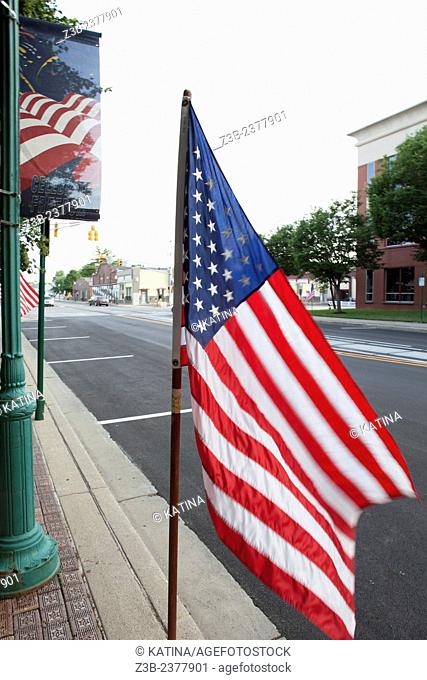 American flag blowing in the breeze on the main square in Noblesville, Indiana, IN, USA,