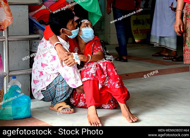 Patients are transported in ambulances to Dhaka Medical Hospital on 3rd August 2021 in Dhaka, Bangladesh. Health workers treat the patients in the intensive...