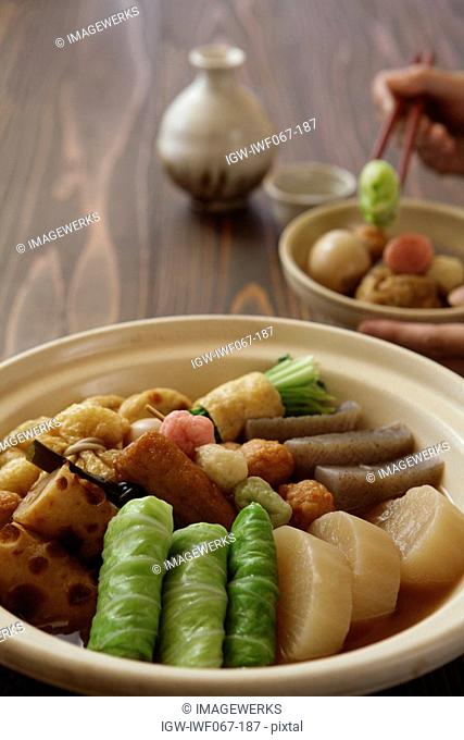 Oden with Saki set on table, close-up