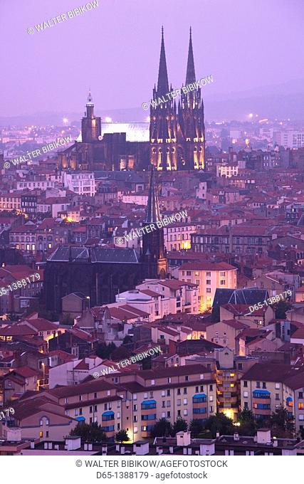 France, Puy-de-Dome Department, Auvergne Region, Clermont-Ferrand, city overview with Cathedrale-Notre-Dame from Parc de Monjuzet, dusk