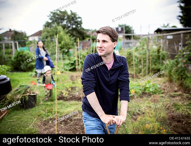 Portrait smiling man looking away in garden