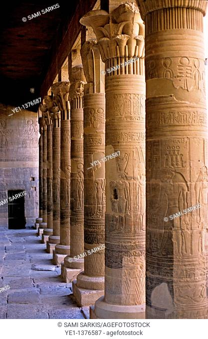 Colonnade marking the entrance to the ancient remains of a temple for Isis on the island of Philae on the Nile river, Egypt