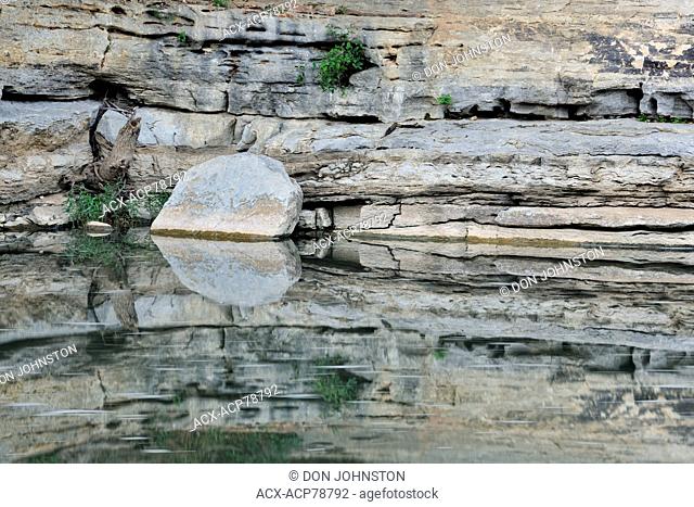 Sandstone bluffs and trees reflected in the Buffalo National River, Buffalo National River- Ozark Unit, Arkansas, USA