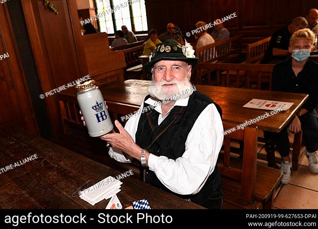19 September 2020, Bavaria, Munich: The guest Andre Pandelm sits in the watering place of the Hofbräuhaus. Despite the cancellation of the Wiesn due to the...