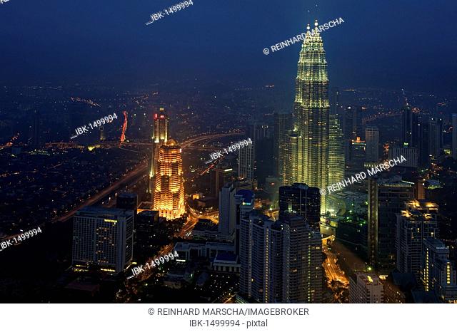 Petronas Towers at night, Menara Petronas, as seen from KL Tower, Kuala Lumpur, Malaysia, Southeast Asia