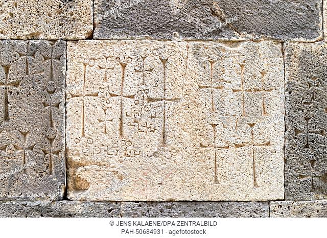 Crosses are engraved in stone at the Tatew monastery of the Armenian Apostolic Church in the south of Armenia in Tatev, Armenia, 24 June 2014
