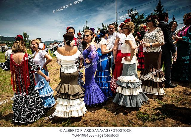 Women dressed in traditional costume ruffled, Andalusian pilgrimage in Villaviciosa, Asturias, Spain