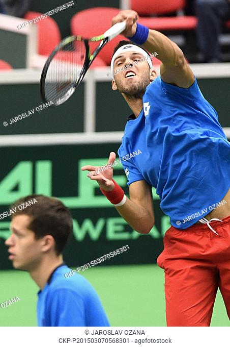 Adam Pavlasek (left), his partner Jiri Vesely pictured in action during the Davis Cup World Group first round doubles tennis match against Samuel Groth and...