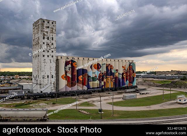 Wichita, Kansas - El Sueño Original (The Original Dream), a mural by Colombian street artist GLeo, painted on the Beachner gain elevator