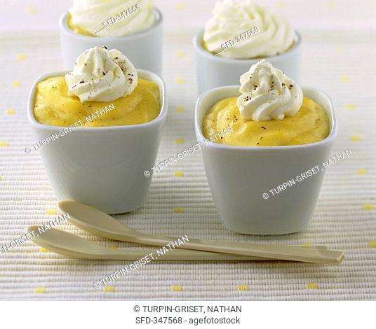 Vanilla custard with cream in small pots