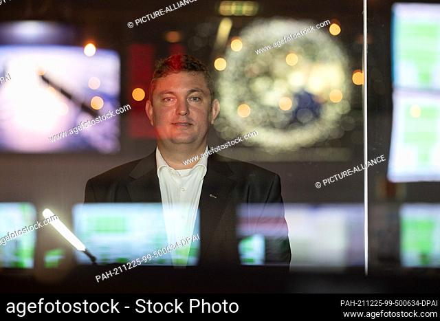 PRODUCTION - 21 December 2021, Hessen, Darmstadt: Simon Plum, head of mission operations at the European Space Agency's Esa Satellite Control Centre