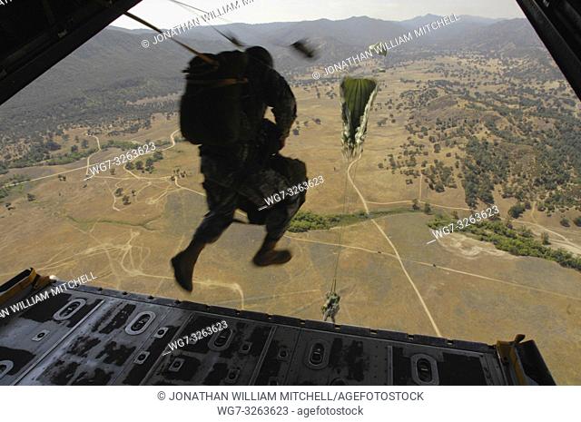 USA California -- 02 Jun 2007 -- US Army soldiers perform a static line parachute jump over the Patricia Drop Zone in California, as part of Operation Hydra