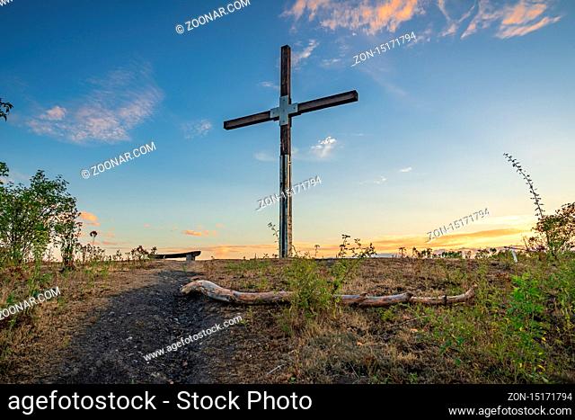 Moers, North Rhine-Westfalia, Germany - July 30, 2018: The cross on top of Halde Pattberg