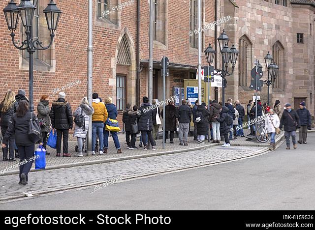 Queue outside a Red Cross vaccination centre during the 2021 pandemic, Nuremberg, Middle Franconia, Bavaria, Germany, Europe