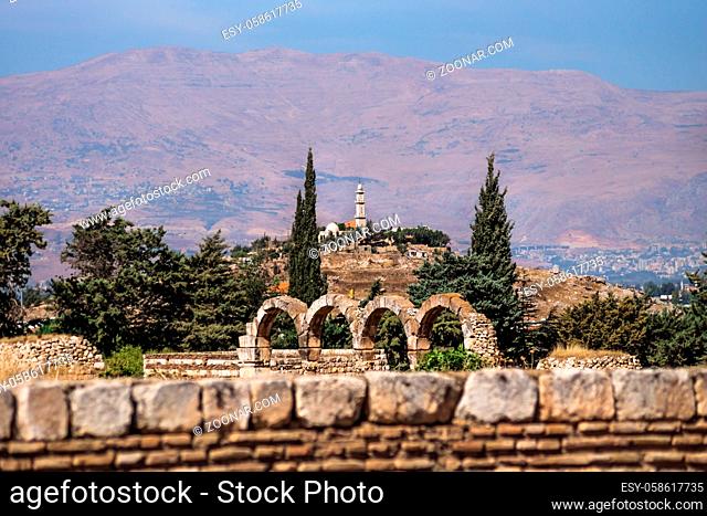 Mosque on a hill with Mountains in the background on a sunny day at Anjar, Bekaa valley, Lebanon