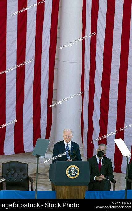 United States President Joe Biden speaks in the the Memorial Amphitheater, in Arlington National Cemetery, on Veterans Day, Thursday, Nov