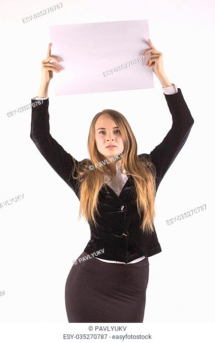 Portrait of beautiful businesswoman holding blank billboard over her head