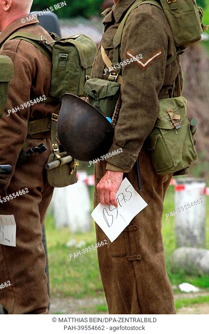 Extras stand in front of a discothek in Osterwieck, Germany, 16 May 2013. Amercan actor George Clooney is filming his movie 'The Monuments Men' in Osterwieck at...
