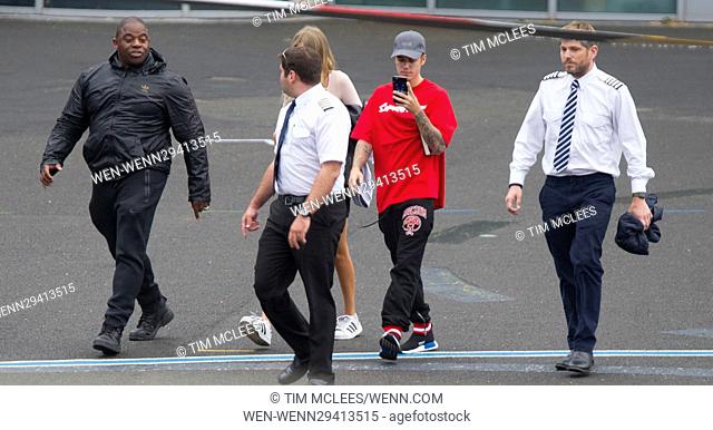 Justin Bieber at Battersea Helipad leaving with latest flame to perform at V festival Featuring: Justin Bieber Where: London