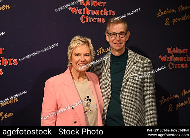 02 December 2023, North Rhine-Westphalia, Cologne: Presenter Birgit Biggi Lechtermann and her husband Ingo Kersting attend the premiere of the 8th Cologne...