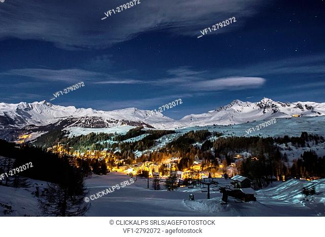 Ski area of Madesimo in a full moon night, Valchiavenna, Italy