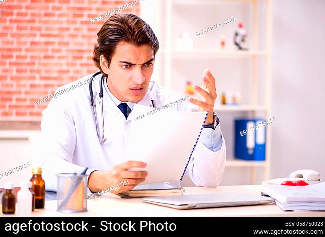 Young doctor working in hospital