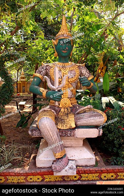 Buddhist statue with green face in Laos