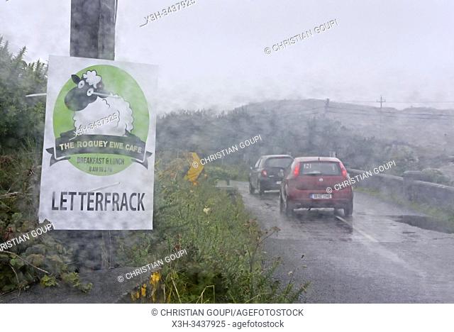 country road under rain near Clifden, Connemara, County Galway, Republic of Ireland, North-western Europe