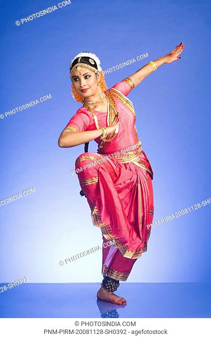 Woman performing Bharatnatyam the classical dance of India