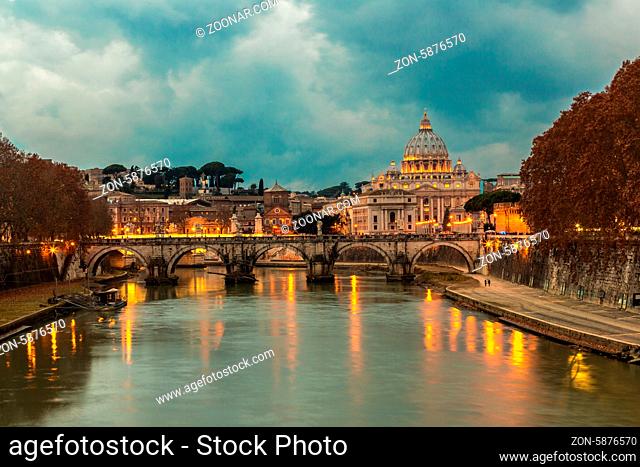 Angelo Bridge and St. Peter's Basilica at dusk, Rome, Italy