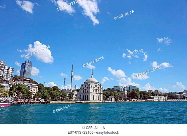 Dolmabahce Mosque Baroque style architecture, view from the Bosphorus Strait in Istanbul, Turkey