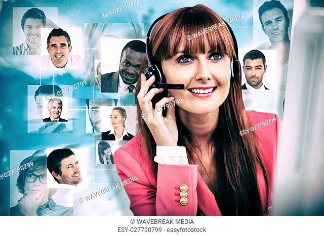Composite image of smiling hipster businesswoman using headset