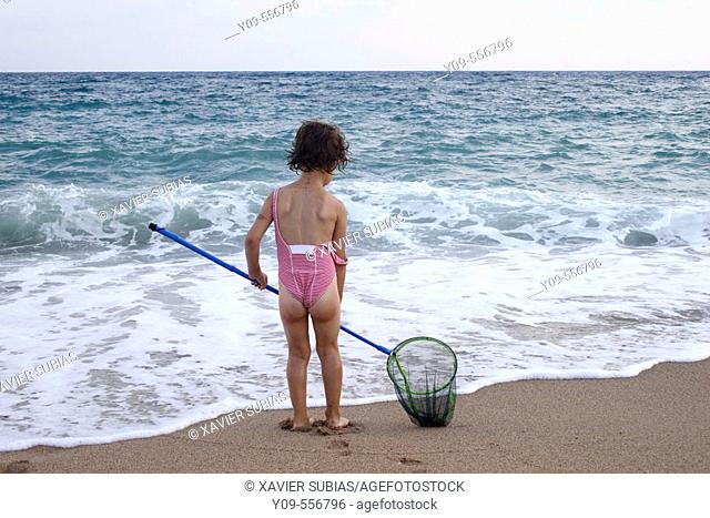 5 years old girl on the beach