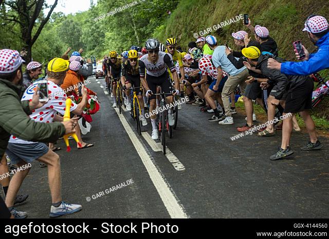 Polish rider Rafal Majka of team UAE-Emirates cycles in the final ascent of Jaizkibel mount pass while fans cheers during the stage two of the 110th Tour de...