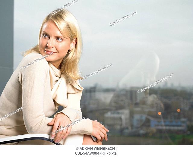 Businesswoman sitting in office